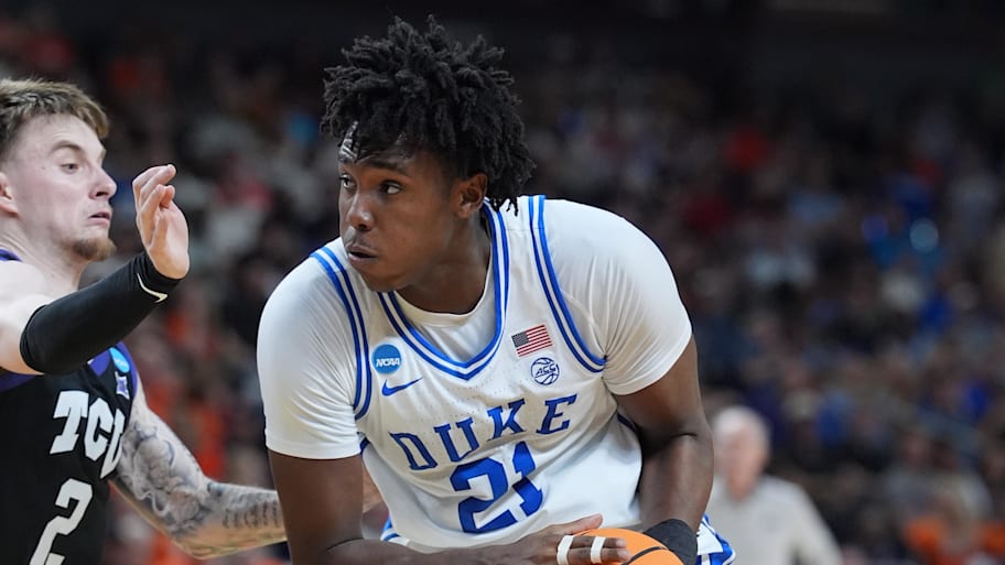 Duke Blue Devils center Patrick Ngongba handles the ball against the Texas Christian University Horned Frogs.