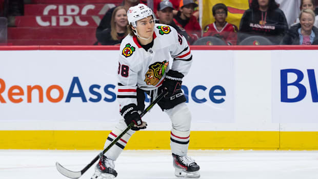 Hockey player in white unifor