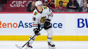 Apr 15, 2025; Ottawa, Ontario, CAN; Chicago Blackhawks center Connor Bedard (98) controls the puck in the second period against the Ottawa Senators at the Canadian Tire Centre. Mandatory Credit: Marc DesRosiers-Imagn Images