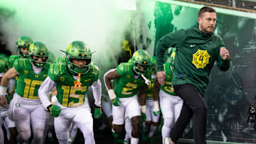 Oregon football coach Dan Lanning leads his team onto the field before the game against Oregon State at Autzen Stadium Friday, Nov. 24, 2023.