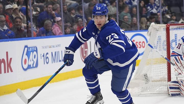 Mar 25, 2026; Toronto, Ontario, CAN; Toronto Maple Leafs forward Matthew Knies (23) skates against the New York Rangers during the first period at Scotiabank Arena. Mandatory Credit: John E. Sokolowski-Imagn Images