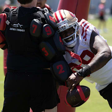 May 9, 2025; Santa Clara, CA, USA; San Francisco 49ers defensive lineman Mykel Williams (98) bats at a ball as part of a rushing drill during the teamís rookie minicamp. Mandatory Credit: D. Ross Cameron-Imagn Images