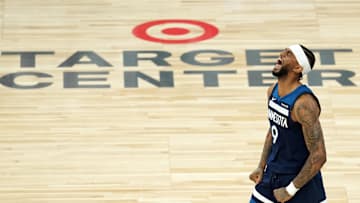 May 26, 2025; Minneapolis, Minnesota, USA; Minnesota Timberwolves guard Nickeil Alexander-Walker (9) reacts against the Oklahoma City Thunder in the second half during game four of the western conference finals for the 2025 NBA Playoffs at Target Center. Mandatory Credit: Jesse Johnson-Imagn Images
