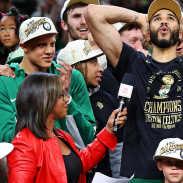 Jun 17, 2024; Boston, Massachusetts, USA; Boston Celtics forward Jayson Tatum (0) celebrates with the Larry O’Brien Trophy after beating the Dallas Mavericks in game five of the 2024 NBA Finals to win the NBA Championship at TD Garden. Mandatory Credit: Peter Casey-USA TODAY Sports