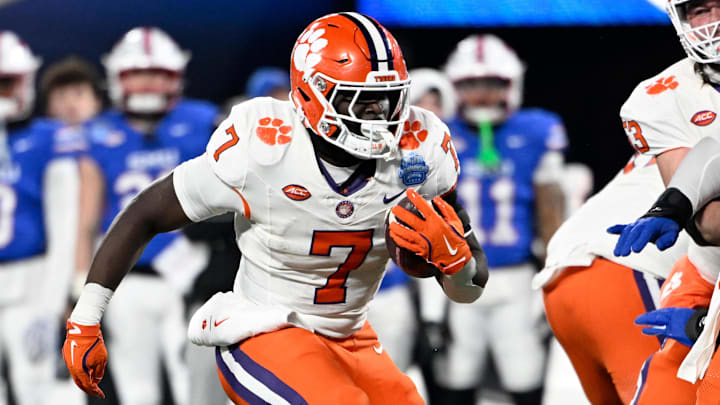 Dec 7, 2024; Charlotte, NC, USA; Clemson Tigers running back Phil Mafah (7) runs during the third quarter against the Southern Methodist Mustangs in the 2024 ACC Championship game at Bank of America Stadium. 
