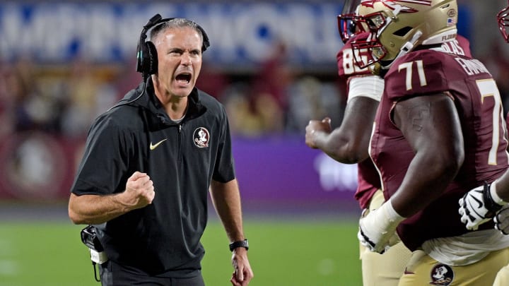 Sep 3, 2023; Orlando, Florida, USA; Florida State Seminoles head coach Mike Norvell is excited during the fourth quarter against the Louisiana State Tigers at Camping World Stadium. Mandatory Credit: Melina Myers-USA TODAY Sports