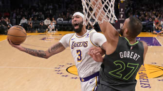 Apr 7, 2024; Los Angeles, California, USA;  Los Angeles Lakers forward Anthony Davis (3) gets past