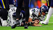 Nov 16, 2025; Inglewood, California, USA; Seattle Seahawks quarterback Sam Darnold (14) dives for a first down during the second half against the Los Angeles Rams at SoFi Stadium. Mandatory Credit: Gary A. Vasquez-Imagn Images