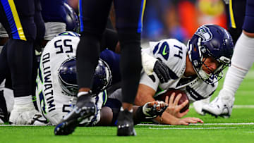 Nov 16, 2025; Inglewood, California, USA; Seattle Seahawks quarterback Sam Darnold (14) dives for a first down during the second half against the Los Angeles Rams at SoFi Stadium. Mandatory Credit: Gary A. Vasquez-Imagn Images