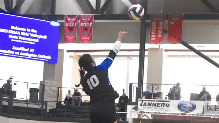 Lexington Catholic High School senior Payton Avilez hits the ball Nov. 8, 2025 in a state semifinal volleyball match against Assumption High School.