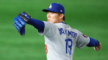 Yoshinobu Yamamoto pitching in Los Angeles Dodgers Workouts: MLB Tokyo Series