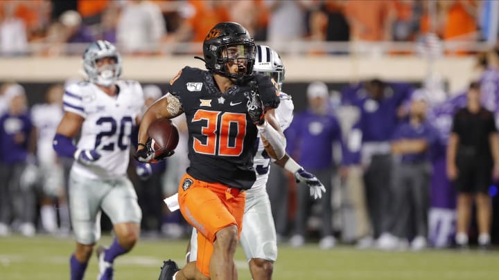 Sep 28, 2019; Stillwater, OK, USA; Oklahoma State Cowboys running back Chuba Hubbard (30) runs for a touchdown against the Kansas State Wildcats during the second half at Boone Pickens Stadium. Oklahoma State won 26-13. Mandatory Credit: Alonzo Adams-USA TODAY Sports