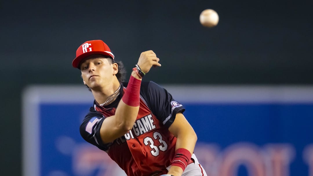 Aug 28, 2022; Phoenix, Arizona, US; West infielder Roch Cholowsky (33) during the Perfect Game All-American Classic high school baseball game at Chase Field. Mandatory Credit: Mark J. Rebilas-Imagn Images