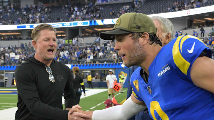 Les Snead, general manager of the Los Angeles Rams shakes the hand of quarterback Matthew Stafford (9). Mandatory Credit: Jayne Kamin-Oncea-Imagn Images