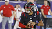 Nov 1, 2024; Boca Raton, Florida, USA;  Florida Atlantic Owls quarterback Cam Fancher (1) looks to throw a pass during the first quarter against the South Florida Bulls at FAU Stadium. Mandatory Credit: Reinhold Matay-Imagn Images
