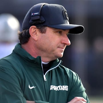 Nov 16, 2024; Champaign, Illinois, USA;  Michigan State Spartans head coach Jonathan Smith during the first half against the Illinois Fighting Illini  at Memorial Stadium. Mandatory Credit: Ron Johnson-Imagn Images