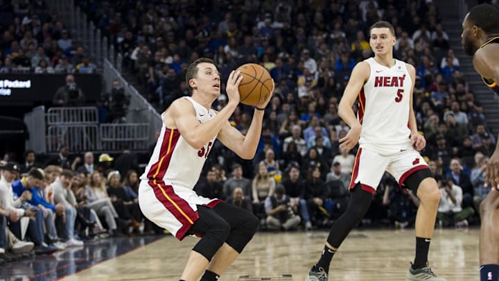 Jan 7, 2025; San Francisco, California, USA; Miami Heat forward Duncan Robinson (55) takes a three-point shot against the Golden State Warriors during the second quarter at Chase Center. Mandatory Credit: John Hefti-Imagn Images