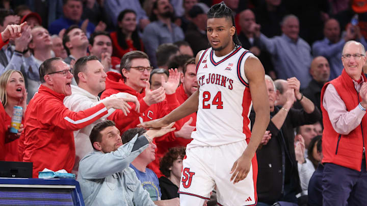 Jan 20, 2026; New York, New York, USA;  St. John's basketball forward Zuby Ejiofor (24) celebrates with the fans after defeating the Seton Hall Pirates 65-60 at Madison Square Garden.