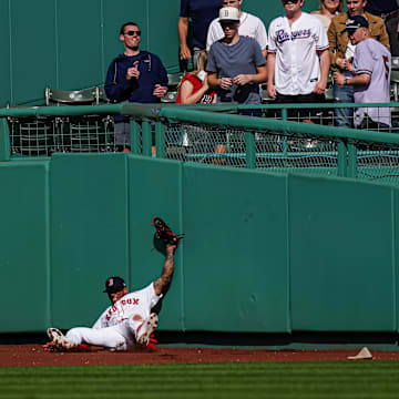 May 8, 2025; Boston, Massachusetts, USA; Boston Red Sox outfielder Ceddanne Rafaela (3) makes the out against the Texas Rangers in the ninth inning at Fenway Park. Mandatory Credit: David Butler II-Imagn Images