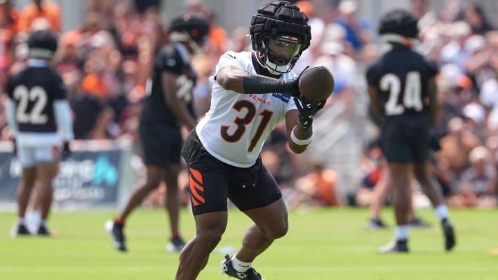 Jul 26, 2024; Cincinnati, OH, USA; Cincinnati Bengals running back Zack Moss (31) completes a catch during training camp practice at Kettering Health Practice Fields. Mandatory Credit: Kareem Elgazzar-USA TODAY Sports