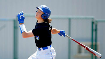 Ethan Holliday hits during a Stillwater High School baseball game in Stillwater, Okla., Saturday, April 30, 2022.