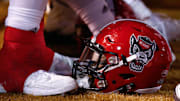 Nov 18, 2017; Winston-Salem, NC, USA; A North Carolina State Wolfpack helmet lays on the sidelines during the game against the Wake Forest Demon Deacons at BB&T Field. Mandatory Credit: Jeremy Brevard-Imagn Images