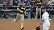 Oct 6, 2024; Los Angeles, California, USA; San Diego Padres catcher Kyle Higashioka (20) runs after hitting a solo home run against the Los Angeles Dodgers in the ninth inning during game two of the NLDS for the 2024 MLB Playoffs at Dodger Stadium. Mandatory Credit: Kiyoshi Mio-Imagn Images