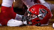 Nov 18, 2017; Winston-Salem, NC, USA; A North Carolina State Wolfpack helmet lays on the sidelines during the game against the Wake Forest Demon Deacons at BB&T Field. Mandatory Credit: Jeremy Brevard-Imagn Images