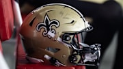 Aug 10, 2024; Glendale, Arizona, USA; Detailed view of a New Orleans Saints helmet during a preseason NFL game at State Farm Stadium. Mandatory Credit: Mark J. Rebilas-Imagn Images