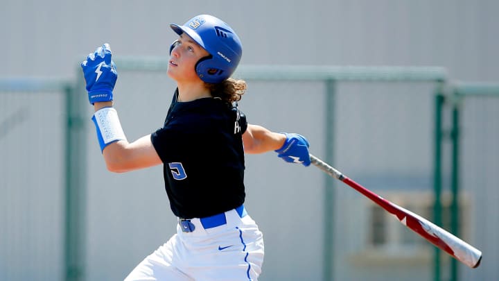 Ethan Holliday hits during a Stillwater High School baseball game in Stillwater, Okla., Saturday, April 30, 2022.