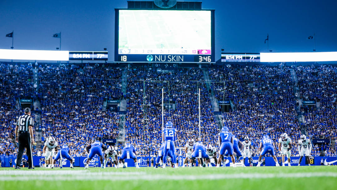 Jake Retzlaff takes a snap in the third quarter against Southern Illinois