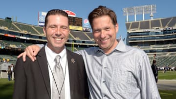 Will Kiss (l) and broadcaster Greg Papa attend the game between Tennessee Titans and the Oakland Raiders at O.co Coliseum on Nov. 24, 2013.