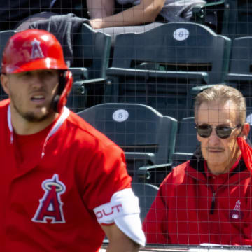 Mar 16, 2021; Tempe, Arizona, USA; Los Angeles Angels owner Arte Moreno (right) and outfielder Mike Trout against the Cleveland Indians during a Spring Training game at Tempe Diablo Stadium. Mandatory Credit: Mark J. Rebilas-USA TODAY Sports