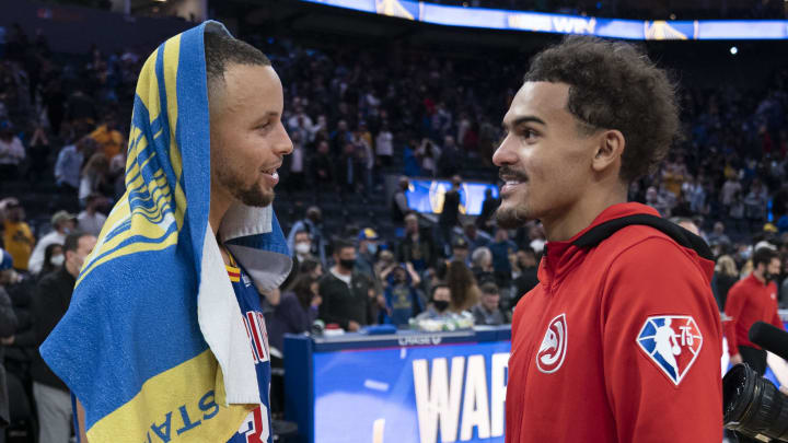 November 8, 2021; San Francisco, California, USA; Golden State Warriors guard Stephen Curry (30) and Atlanta Hawks guard Trae Young (11) talk after the game at Chase Center. Mandatory Credit: Kyle Terada-USA TODAY Sports