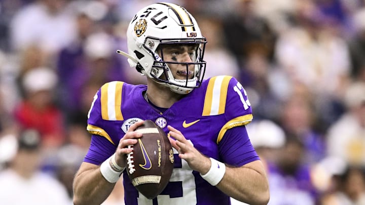 Dec 31, 2024; Houston, TX, USA; LSU Tigers quarterback Garrett Nussmeier (13) throws a pass during the first half against the Baylor Bears at NRG Stadium. The Tigers defeat the Bears 44-31. Dec 31, 2024; Houston, TX, USA; LSU Tigers quarterback Garrett Nussmeier (13) throws a pass during the first half against the Baylor Bears at NRG Stadium. The Tigers defeat the Bears 44-31.