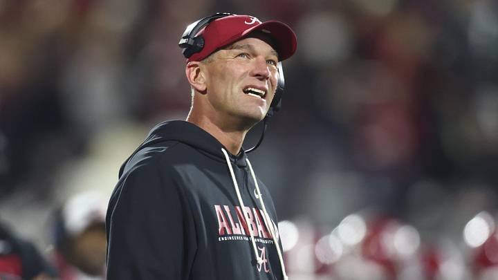 Dec 19, 2025; Norman, OK, USA; Alabama Crimson Tide head coach Kalen Deboer looks on from the sidelines in the first half against the Oklahoma Sooners at Gaylord Family OK Memorial Stadium. Mandatory Credit: Mark J. Rebilas-Imagn Images