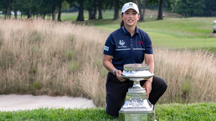 Ruoning Yin poses with the championship trophy after winning the 2023 KPMG Women's PGA Championship.