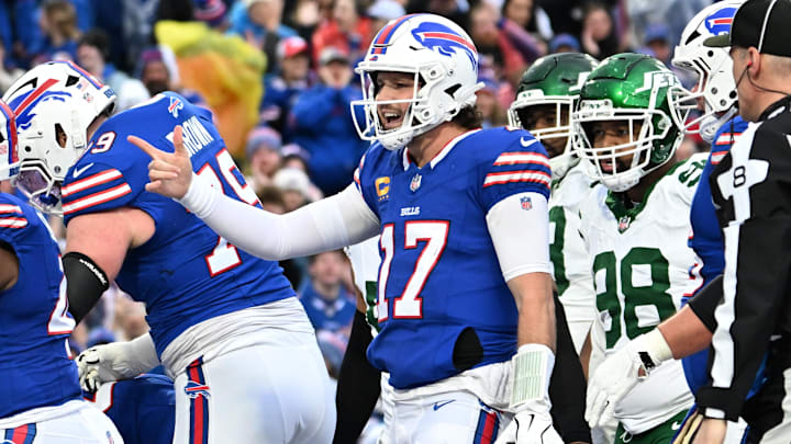 Dec 29, 2024; Orchard Park, New York, USA; Buffalo Bills quarterback Josh Allen (17) celebrates after scoring a rushing touchdown against the New York Jets. Dec 29, 2024; Orchard Park, New York, USA; Buffalo Bills quarterback Josh Allen (17) celebrates after scoring a rushing touchdown against the New York Jets.