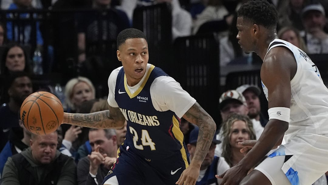 Mar 21, 2025; Minneapolis, Minnesota, USA; New Orleans Pelicans guard Jordan Hawkins (24) works around Minnesota Timberwolves guard Anthony Edwards (5) in the first quarter at Target Center. Mandatory Credit: Bruce Kluckhohn-Imagn Images Mar 21, 2025; Minneapolis, Minnesota, USA; New Orleans Pelicans guard Jordan Hawkins (24) works around Minnesota Timberwolves guard Anthony Edwards (5) in the first quarter at Target Center. Mandatory Credit: Bruce Kluckhohn-Imagn Images