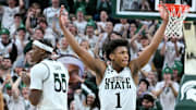 Jan 19, 2025; East Lansing, Michigan, USA;  Michigan State Spartans guard Jeremy Fears Jr. (1) urges the crowd to get loud during the second half against the Illinois Fighting Illini at Jack Breslin Student Events Center. Mandatory Credit: Dale Young-Imagn Images