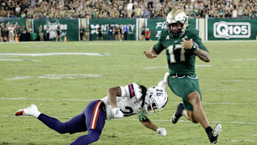 Byrum Brown ran for more than 100 yards and led USF to its fourth straight win Saturday over Florida Atlantic