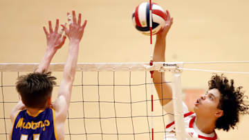 Penn Hills' Corey Coleman attempt to blast the ball past a Plum defender Tuesday night at Penn Hills High School. The Indians beat Plum 3-1 to snap a 64-match section losing streak.