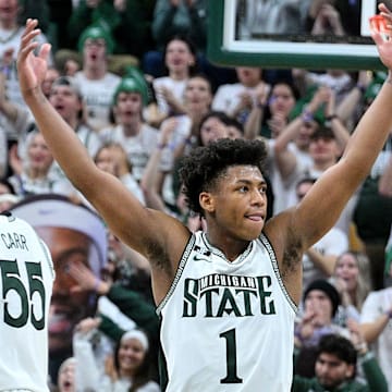 Jan 19, 2025; East Lansing, Michigan, USA;  Michigan State Spartans guard Jeremy Fears Jr. (1) urges the crowd to get loud during the second half against the Illinois Fighting Illini at Jack Breslin Student Events Center. Mandatory Credit: Dale Young-Imagn Images