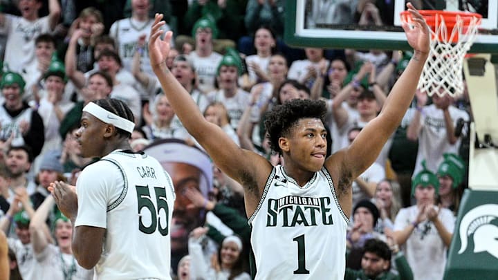 Jan 19, 2025; East Lansing, Michigan, USA; Michigan State Spartans guard Jeremy Fears Jr. (1) urges the crowd to get loud during the second half against the Illinois Fighting Illini at Jack Breslin Student Events Center. Mandatory Credit: Dale Young-Imagn Images Jan 19, 2025; East Lansing, Michigan, USA; Michigan State Spartans guard Jeremy Fears Jr. (1) urges the crowd to get loud during the second half against the Illinois Fighting Illini at Jack Breslin Student Events Center. Mandatory Credit: Dale Young-Imagn Images