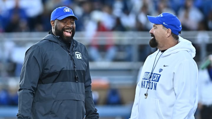 Bryant head coach Quad Sanders (left) and Conway head coach Buck James (right)