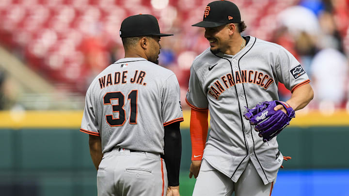 Mar 30, 2025; Cincinnati, Ohio, USA; San Francisco Giants shortstop Willy Adames (2) high fives first baseman LaMonte Wade Jr. (31) after the victory over the Cincinnati Reds at Great American Ball Park. Mandatory Credit: Katie Stratman-Imagn Images