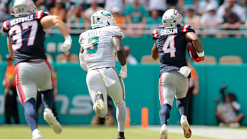 New England Patriots running back Antonio Gibson (4) carries the football for a kickoff return against the Miami Dolphins during the fourth quarter at Hard Rock Stadium in Week 2.