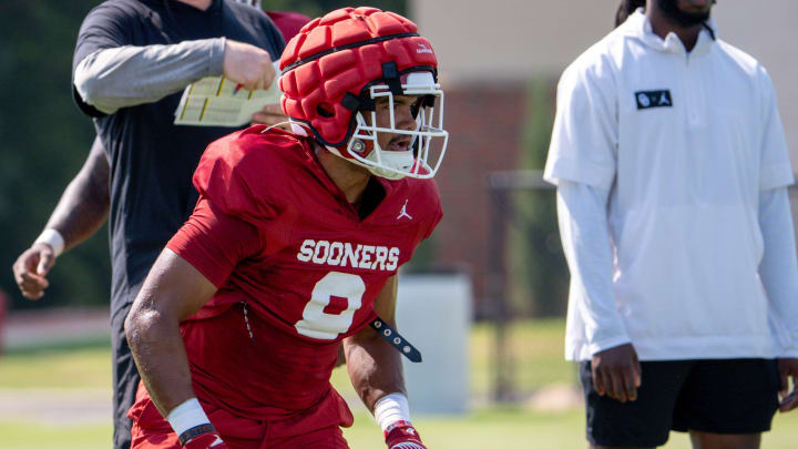 Taylor Tatum (8) runs drills during a Oklahoma football practice in Norman, Okla., on Monday, Aug. 5, 2024.