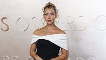 Katie Feeney on the red carpet at the 97th Oscars at the Dolby Theatre at Ovation Hollywood in Los Angeles.