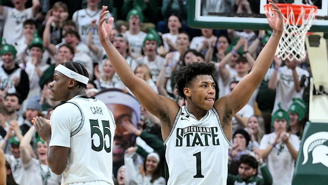 Jan 19, 2025; East Lansing, Michigan, USA;  Michigan State Spartans guard Jeremy Fears Jr. (1) urges the crowd to get loud during the second half against the Illinois Fighting Illini at Jack Breslin Student Events Center. Mandatory Credit: Dale Young-Imagn Images